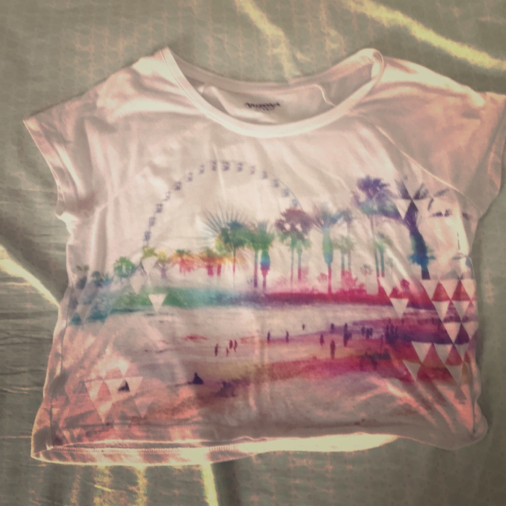 A crop whiteshirt with palm beach pattern on front